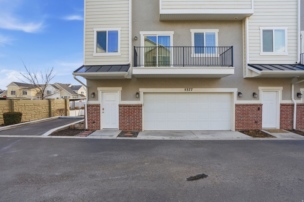 Photo of 5377 W MOUNT GIBBS PL #410, Herriman, UT 84096 (MLS # 2138721)
