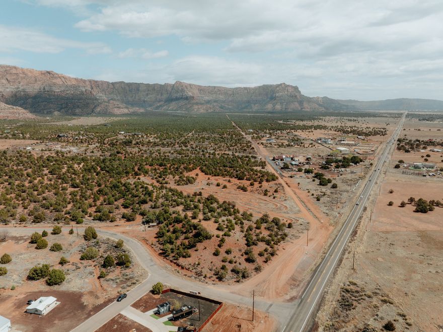 Tucked next to BLM land, this one-of-a-kind 2.33-acre view lot offers a unique opportunity to own your own hill with unobstructed views that stretch for miles. Imagine waking up every day to breathtaking scenery and the tranquility of nature right at your doorstep. Currently zoned as open space, this property provides the perfect canvas for your dream home or a serene getaway. With the surrounding BLM land, you'll enjoy privacy and access to outdoor adventures, making it an ideal spot for nature lovers and those seeking a peaceful retreat. Don't miss out on this rare gem!