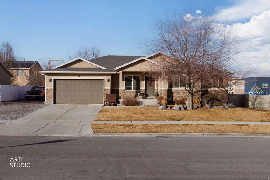 Open House- Saturday 2-21 from 12:00-2:00 PM.  Welcome to this charming rambler located in a great established Saratoga Springs neighborhood! This home offers 3 bedrooms and 2 bathrooms on the main level, featuring vaulted ceilings and an open floor plan that creates an inviting living space.  The fully landscaped yard provides excellent outdoor enjoyment, while the basement includes a fourth finished bedroom and additional unfinished space with unlimited potential for future living areas, storage, a home theater, gym, or customization to fit your needs.  Ideally situated close to schools, parks, and local amenities, this home offers both comfort and opportunity in a desirable location, all with no HOA.  A fantastic chance to own a home with room to grow in Saratoga Springs!  The home also has RV parking on the side.  Square footage figures are provided as a courtesy estimate only and were obtained from county records. Buyer is advised to obtain an independent measurement.