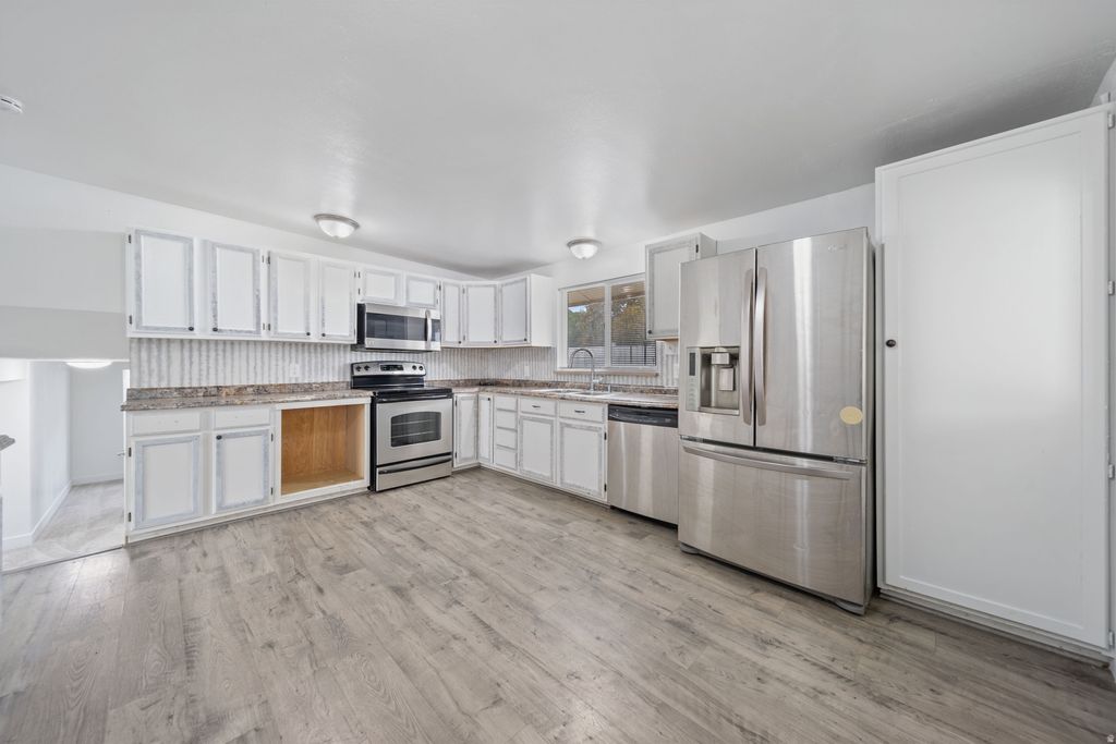 Photo of 4854 W VAN CHERRY WAY, West Valley City, UT 84120 (MLS # 2122922)