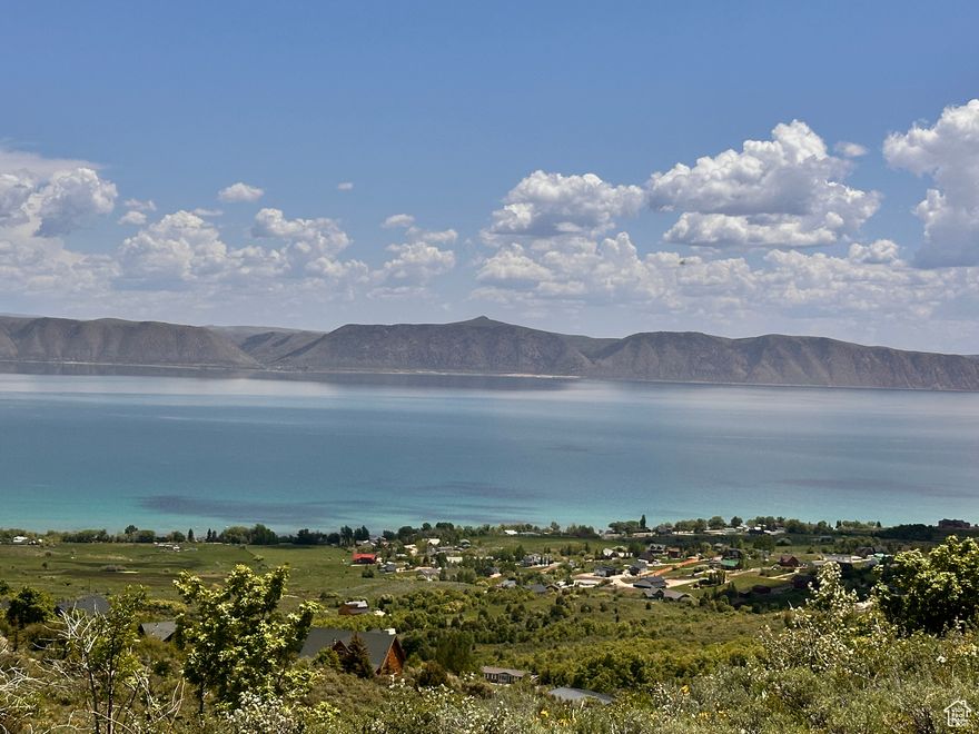 Unobstructed Bear Lake Views  Top of Bear Lake West Plat C Build your dream Bear Lake hideaway at the top of Bear Lake West Plat C, where panoramic north-to-south views stretch endlessly across the lake & will never be blocked. Enjoy access to  amenities, including a member discount for Golf, a heated outdoor pool (summer months), private beach access for owners only, & tennis/pickleball courts. No short-term rentals allowed, making this a peaceful and private community ideal for full-time living or second-home escapes. Make the move and find your piece of paradise above Bear Lake.