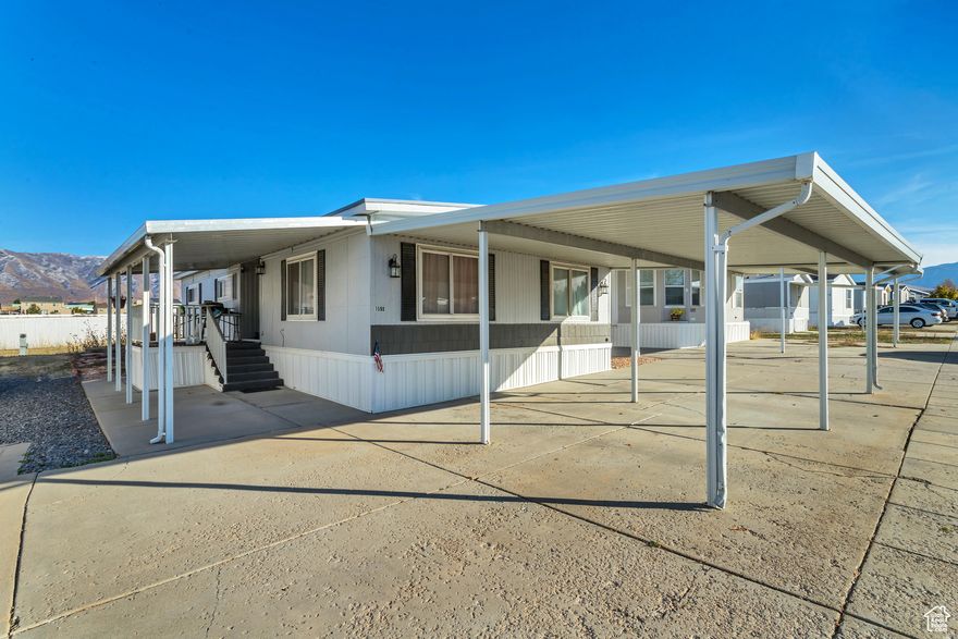 CHECK OUT THIS NEW DOUBLE WIDE MOBILE HOME FOR SALE! RECENTLY REMODELED WITH LVP FLOORING,  STAINLESS APPLIANCES, WASHER/DRYER, KITCHEN, BATHS, INTERIOR/EXTERIOR PAINT, SECURITY CAMERAS,  CENTRAL AC AND HEAT ETC. MUST SEE INSIDE TO APPRECIATE. TWO COVERED PARKING SPACES, TWO EXTRA  UNCOVERED SPACES, ROOM FOR SMALLER RV/CAMPER, TWO COVERED DECKS AND LARGE BACK PATIO WITH  NICE MOUNTAIN VIEWS AND AFTERNOON SHADE. STORAGE SHED/WORKSHOP WIRED AND INCLUDED. ALL  APPLIANCES AND SOME FURNISHINGS ARE NEGOTIABLE. A GREAT STARTER, SMALL FAMILY, OR RETIREMENT  HOME. SCHEDULE YOUR APPOINTMENT TODAY! All footage and measurements are deemed reliable but not guaranteed.  Buyer is advised to obtain their own measurements and complete due-diligence to their satisfaction."