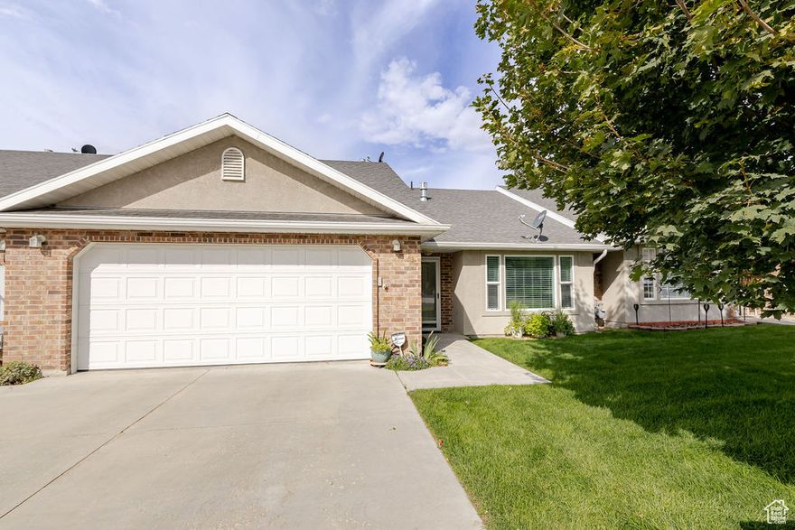 Beautiful single level townhome located in a peaceful 55+ community in Smithfield! The interior has been updated with beautiful flooring and quartz countertops. Don't worry about mowing or shoveling anymore as the HOA is responsible for those lame chores. The garage has a lot of space too! Great opportunity for those looking for a single level home! Square footage figures are provided as a courtesy estimate only and were obtained from county records. Buyer is advised to obtain an independent measurement. Buyer and buyer agent to verify all info.