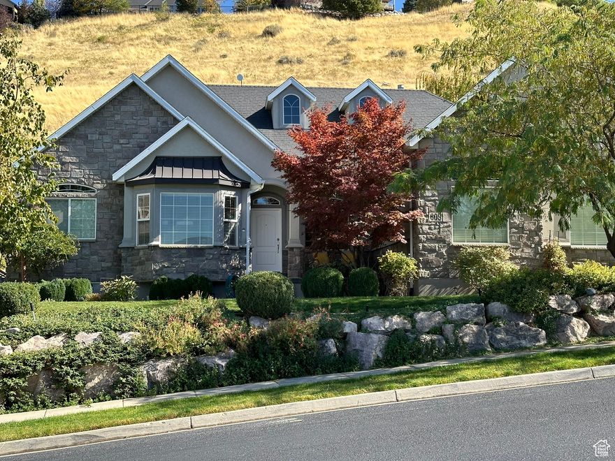 ***PRICE REDUCTION***Beautiful 6 bed, 5 bath home with open living areas and vaulted ceilings create a welcoming space. The primary bedroom includes an ensuite with walk-in closet and bubbler tub. Enjoy cooking in your updated kitchen with Quartz countertops and white cabinets. The large Bonus Room is a versatile area for any need. Ample parking for up to 6 vehicles and mature landscaping with patio & pergola. Downstairs Level/Apartment is a 3 bed, 1  bath 1,900 sqft living space that is ideal for guests or as a rental.