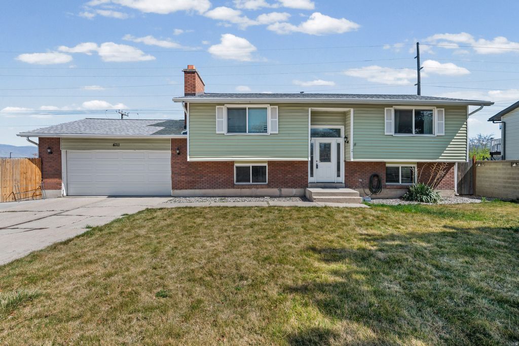 Photo of 4311 S STAFFORD WAY W, Salt Lake City, UT 84119 (MLS # 2146226)
