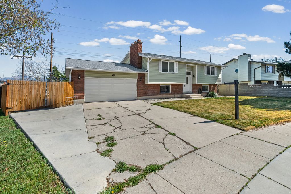 Photo of 4311 S STAFFORD WAY W, Salt Lake City, UT 84119 (MLS # 2146226)