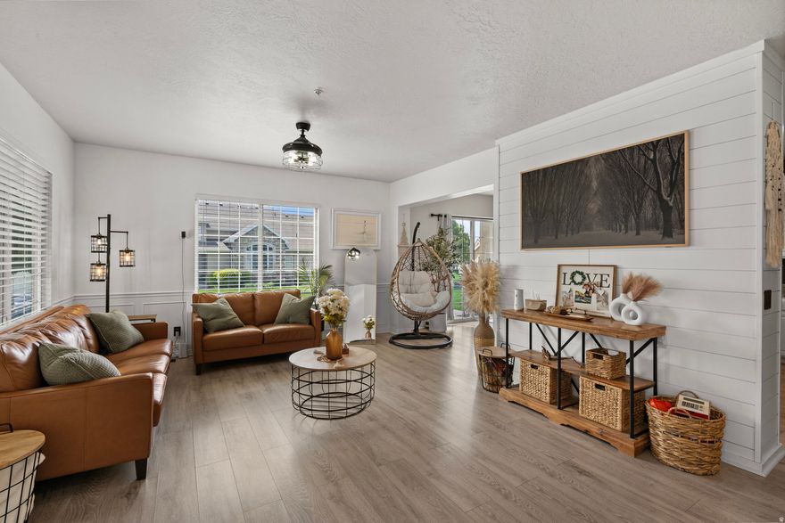 Completely updated townhome in luxurious Haymaker Retreat with $30,000 in upgrades. Gated community within the heart of American Fork. Stainless steel appliances and elegant countertops throughout the kitchen with 9 foot ceilings throughout. The spacious master suite has a vaulted ceiling. An extra room on the main floor offers versatility; use it as a home office or a cozy piano room to suit your lifestyle. New A/C unit was installed in the last year, new carpet, and the deck was redone as well. The community is well maintained, with a fenced pool, a clubhouse, a fitness room, and playgrounds. This unit could be purchased as a rental and used as an investment property. Just minutes from American Fork Hospital and a minute from State Street.