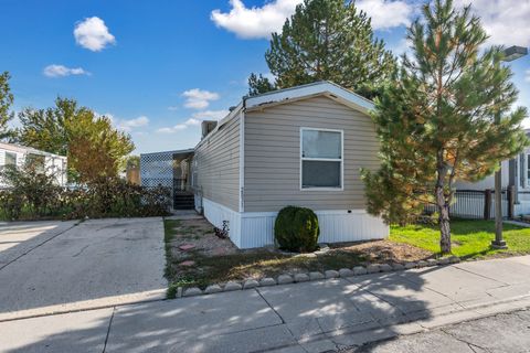 Photo of 2831 S SNOWDON PARK DR Dr #122, West Valley City, UT 84119 (MLS # 2121055)