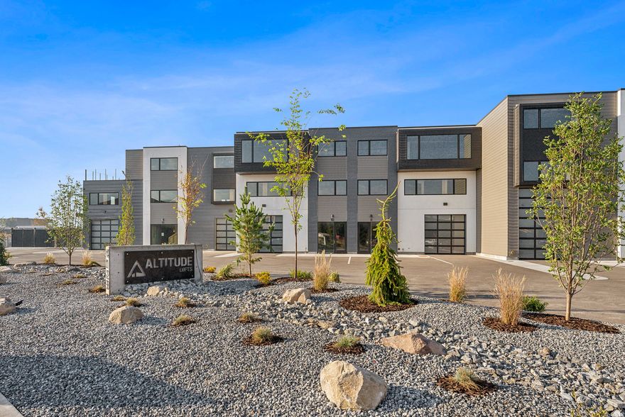 Altitude Lofts represents the pinnacle of Park City flex space; a perfect blank canvas for your LIVE-WORK-PLAY build. This boutique 11-unit project sits in the heart of the Forestdale corridor, ideally positioned between I-80 and SR-248 off HWY-40's frontage road. Service Commercial (SC) zoning unlocks a myriad of uses, including warehouse, retail, office, commercial, and residential dwelling units.  Ideal for car collectors, hobbyists, business owners, or anyone seeking a Park City crash pad, the space easily accommodates sports simulators, workshops, art studios, trailers, RVs, and more.  This unit features a ~30'  45' warm-shell configuration with buildout potential of up to 3,703 sq ft across three levels. Utilities are stubbed, the top floor and access stairs are installed, and the unit is pre-engineered for a middle floor. The development team provides a pre-construction meeting (including architect and builder) to guide your interior buildout.