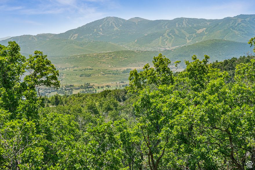 Discover a coveted homesite in The Preserve- a serene, gated community known for its breathtaking natural beauty and privacy. This south-facing, 15-acre lot offers unobstructed panoramic views of Park City's ski resorts and the Uinta Mountains. This lot features a gentle slope and backs to open space, creating a secluded mountain retreat surrounded by native wildlife, mature trees, and untouched landscape. Additionally, KLIMA architectural plans (pre-approved by The Preserve) are included, helping streamline your building process and bring you closer to realizing your dream mountain home. Primary House size not to exceed 10,000 sq ft and 32' in height, guest house can be a maximum of 2,000 sq ft.   Located within the Park City School District, this exceptional lot provides quick access to everything Park City has to offer. The Preserve is one of Park City's most scenic gated communities, situated on 1700 acres of land with views of Park City and its ski resorts and the Wasatch Back. Homesites within the The Preserve provide remarkable privacy for their owners while affording them easy access to everything Park City has to offer - Kimball Junction is only 10 minutes away, and Park City's world-class ski resorts (Park City, Deer Valley, and Park City Canyons Village) are only 15 minutes away.