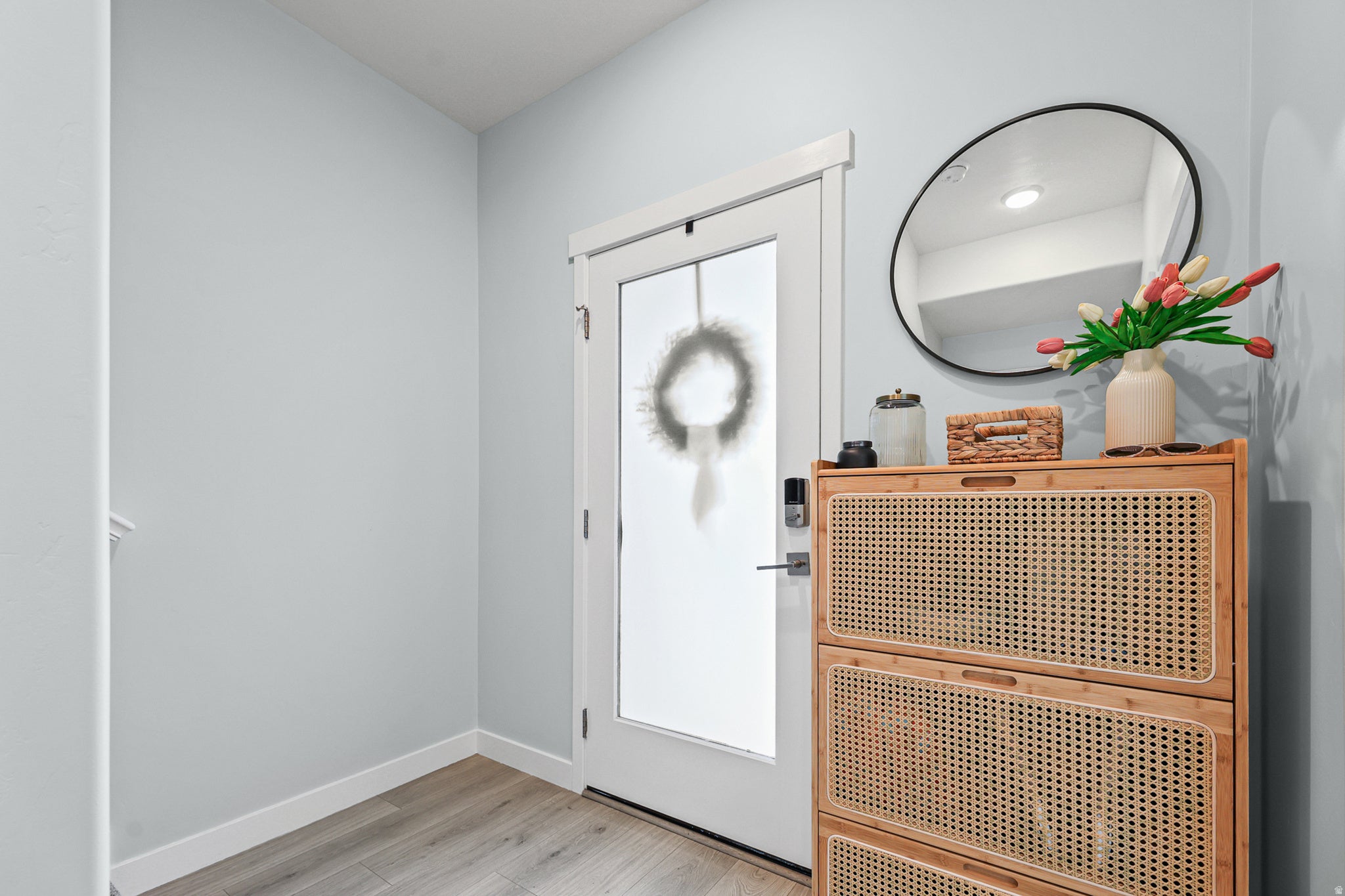 Frosted glass entry door with smart lock