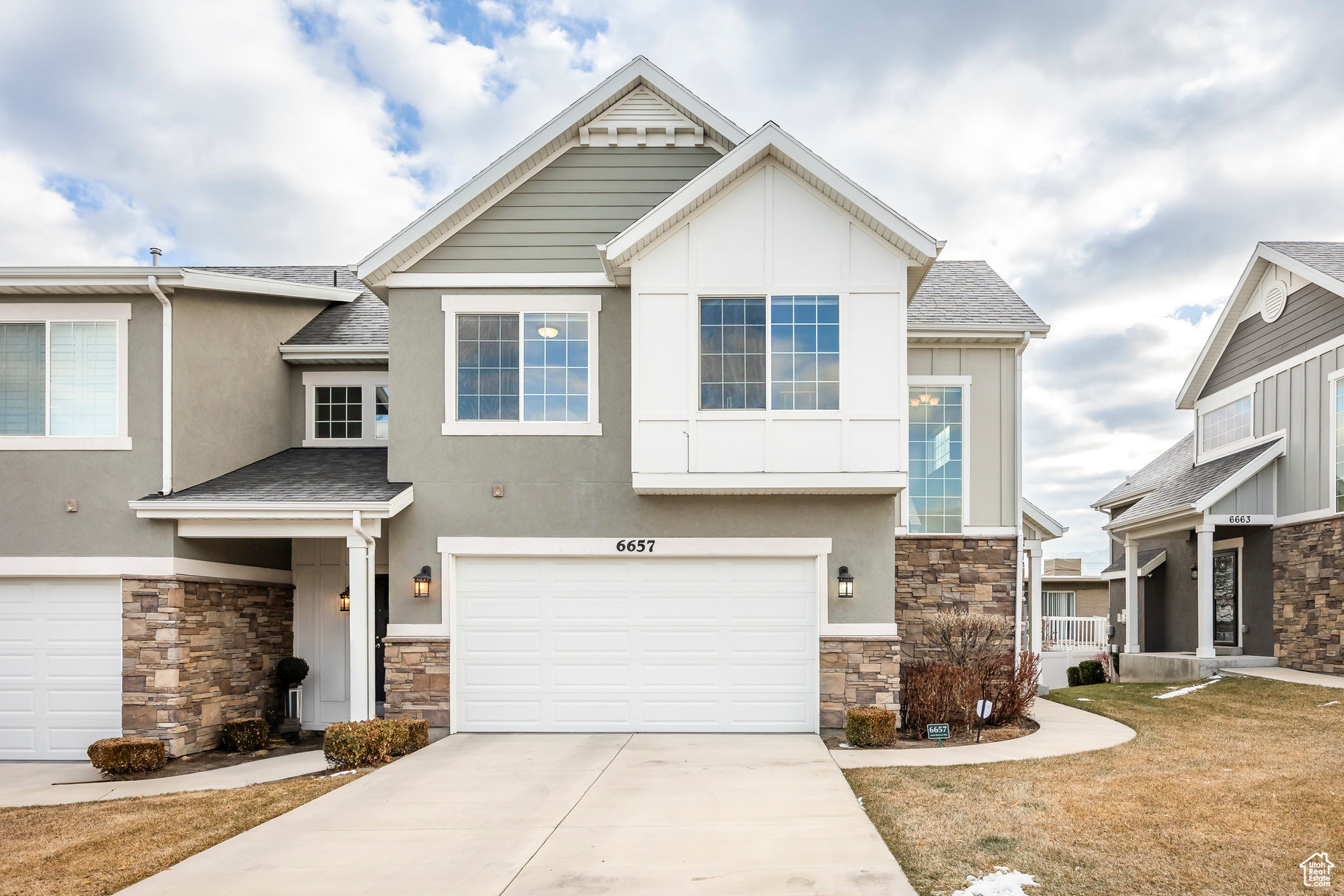 This beautifully maintained 2018 end-unit townhome offers a perfect blend of comfort and convenience, minutes from Murray Parkway Golf Course, Top Golf, and local dining. Situated at the very southern border of Taylorsville, near West Jordan and Midvale, this home provides excellent freeway access to 215 and I-15 and a central location in the heart of the valley. With Google Fiber availability for fast internet, the open main floor boasts vaulted ceilings, a gas fireplace with blower, a modern kitchen with thick granite countertops, gas range with air fryer, and a pantry. The primary bedroom offers stunning mountain views and a walk-in closet with an en suite bathroom. The unfinished basement is pre-plumbed for a bathroom and has space for an additional bedroom, offering room to grow. Community perks include a playground and dog park. Pets are welcome, and rentals with 12-month leases are permitted. Perfect for anyone seeking low-maintenance living in a prime location. Square footage figures are provided as a courtesy estimate only and were obtained from previous appraisal.  Buyer is advised to obtain an independent measurement.