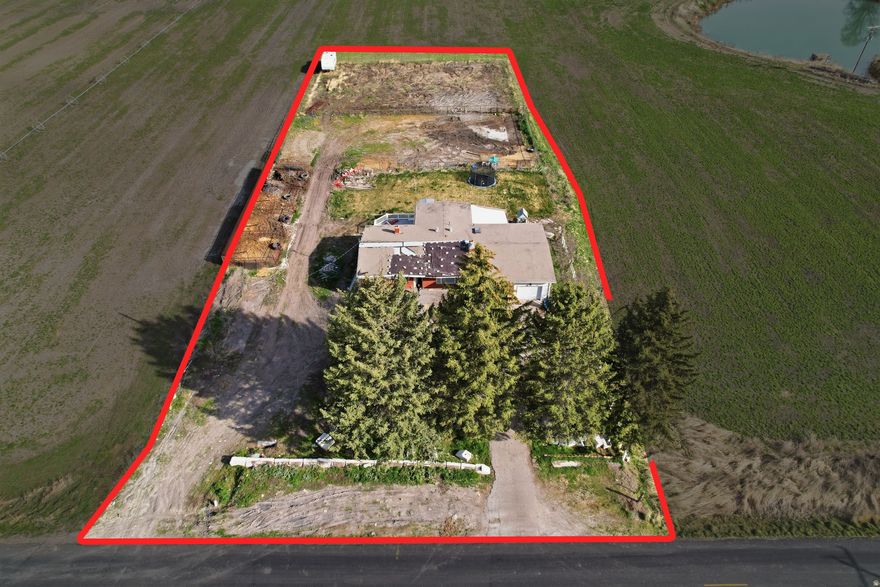 Great opportunity for investors or buyers looking to add value! This property is being sold AS-IS and priced accordingly, offering incredible potential for the right buyer. With a little vision and some updates, this home can truly shine. Welcome to this 3-bedroom, 2.5-bath home situated on 1.16 acres-plenty of space to spread out and make it your own. Livestock is welcome, making it a perfect option for those seeking a bit of country living with room to grow. Items not included in the sale are as follows. 5th wheel, skid steer, compressor and some fencing in the back of the property.  All information herein is deemed reliable but is not guaranteed. The buyer and buyer agent are responsible to verify all listing information, including square feet/ acreage, to the buyer's own satisfaction.