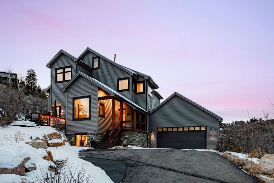Nestled on the sought-after Pinebrook hillside, this tastefully remodeled home offers unmatched privacy, panoramic views, and a rare sense of space with two combined lots totaling 1.26 acres. Ideally situated just minutes from Park City's world-class ski resorts, 5 minutes from Woodward Park City, and 20 minutes from Salt Lake City, it's the perfect mountain retreat with urban convenience. The home has been fully renovated in a sleek contemporary style, featuring a new gourmet kitchen with custom cabinetry, Thermador induction cooktop, quartz countertops, and stainless steel appliances. All bathrooms, flooring, windows, and HVAC have been updated with high-quality finishes throughout. The open main level includes a spacious living room with 180-degree views and a linear fireplace, a formal dining area that seats 12, and a breakfast nook with stunning mountain vistas. Upstairs are two primary suites with en-suite baths and breathtaking views, along with a generous office. The lower level includes a spacious living area that would make a greatmother in law suite with bathroom and separate entrance along with an additional en-suite bedroom. Three outdoor decks capture the dramatic landscape, surrounded by striking rock formations and natural beauty. Additional upgrades include a hot tub, updated landscaping, gutters, and heat tape. Furniture is negotiable. Enjoy the outdoors with the extensive Pinebrook private hiking and biking trails along with accommunity pickle ballcourt, tennis courts, and parks. With a motivated seller, this exceptional property represents a rare opportunity in one of Park City's most desirable neighborhoods.