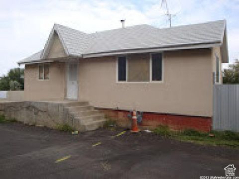 Photo of 235 E 700 S, Clearfield, UT 84015 (MLS # 2110176)