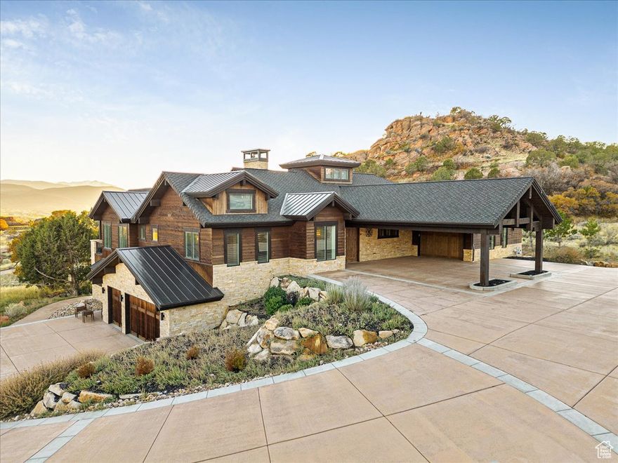 This is your opportunity to own the home with FULL GOLF MEMBERSHIP AVAILABLE and lot that Jack Nicklaus himself selected when building this golf course.  In the prestigious Red Ledges community this 7,016 sq ft mountain estate blends sophisticated design with rustic elegance, offering panoramic views of the 9th and 18th holes of the Jack Nicklaus Signature Red Ledges Golf Course.  It is walking distance of  the main club house, swimming pool, tennis courts, driving range, and golf club house.  The open-concept layout of the home features vaulted ceilings, hardwood floors, instant heated tankless water, Sonos, and expansive thermal windows framing breathtaking views. The kitchen showcases quartz countertops, custom cabinetry, and a wet bar-perfect for entertaining. The basement is an entertainers haven complete with a full gym, built in sauna, game room, and Track Man golf simulator. With over 1,000 sq feet deck off the back of the home, you can enjoy the scenery and views that Red Ledges has to offer.  The insulated garages, smart garage openers with MyQ, fiber concrete driveways, are a great added feature. Every detail reflects quality craftsmanship and timeless mountain luxury.