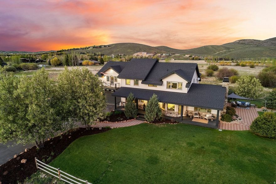 This rare 4.5-acre property in the heart of Park City's coveted Old Ranch Road neighborhood offers the peace, quiet, and wide-open feel of true rural living--yet remains just minutes from Kimball Junction's amenities, top-rated schools, and world-class skiing, hiking, and biking. Set amidst protected wetlands and expansive open space, the property delivers a sense of privacy and connection to nature that is increasingly hard to find. Step out your door to the newly expanded Old Ranch Road trail system, providing easy access to miles of scenic paths for walking and biking providing easy access to Willow Creek Park and the endless trails in Round Valley.  The perfect year-round Base Camp for the Park City lifestyle. With sweeping resort views from the covered front porch and a prized end-of-street location, the home enjoys a tranquil setting where wildlife is part of everyday life--fox, Sandhill cranes, and even migrating elk herds are frequent visitors. The surrounding open space not only enhances the views and serenity, but also preserves the natural beauty and low-density character that make Old Ranch Road so special. The 4-bedroom, 3.5-bath home is thoughtfully designed to capture views from nearly every room, including the renovated, oversized upstairs family room, complete with an additional kitchen and laundry area--ideal for guests or flexible living. A spacious outdoor patio and boulder fire pit create inviting outdoor gathering spaces, perfect for taking in the fresh mountain air and stunning surroundings.  If you're looking to expand, the sellers have commissioned conceptual plans by renowned local architect Constantino Grandjacquet, offering a thoughtful vision for adding more space and a bit more flexibility to the home.  This is a rare opportunity to enjoy acreage, privacy, and direct trail access in one of Park City's most sought-after neighborhoods.