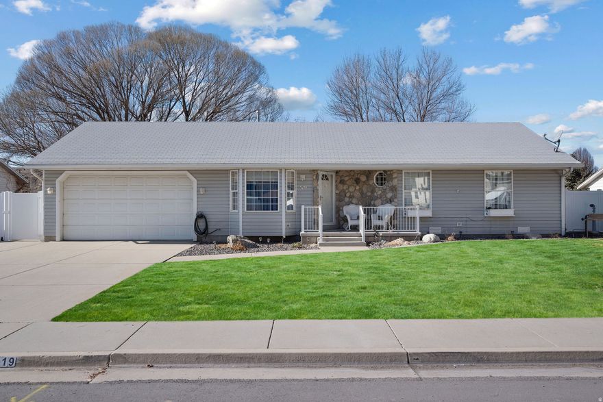 Charming rambler located in a quiet, low-traffic neighborhood just minutes from the city park. This well-maintained home has a functional, open layout that shows clean and inviting. Enjoy a wonderful shady backyard featuring mature trees, full fencing, and a covered patio-perfect for relaxing or entertaining. Flat, fully landscaped lot with automatic sprinklers, curb and gutter, sidewalks, and mountain views. Attached garage and ample storage including shed(s). Convenient location with easy access to schools, parks, and local amenities.Square feet as per County.  Buyer and Buyer's Broker to verify all information including square footage and acreage.