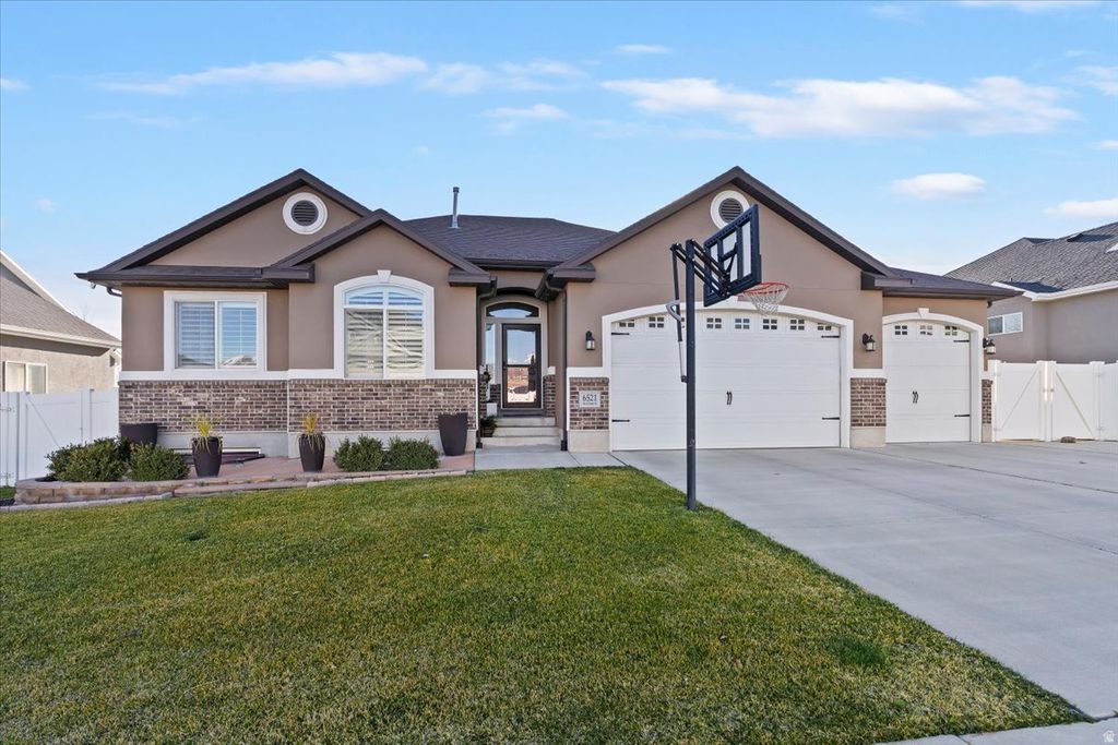 Photo of 6521 S MOUNT ADAMS DR, West Valley City, UT 84118 (MLS # 2143337)