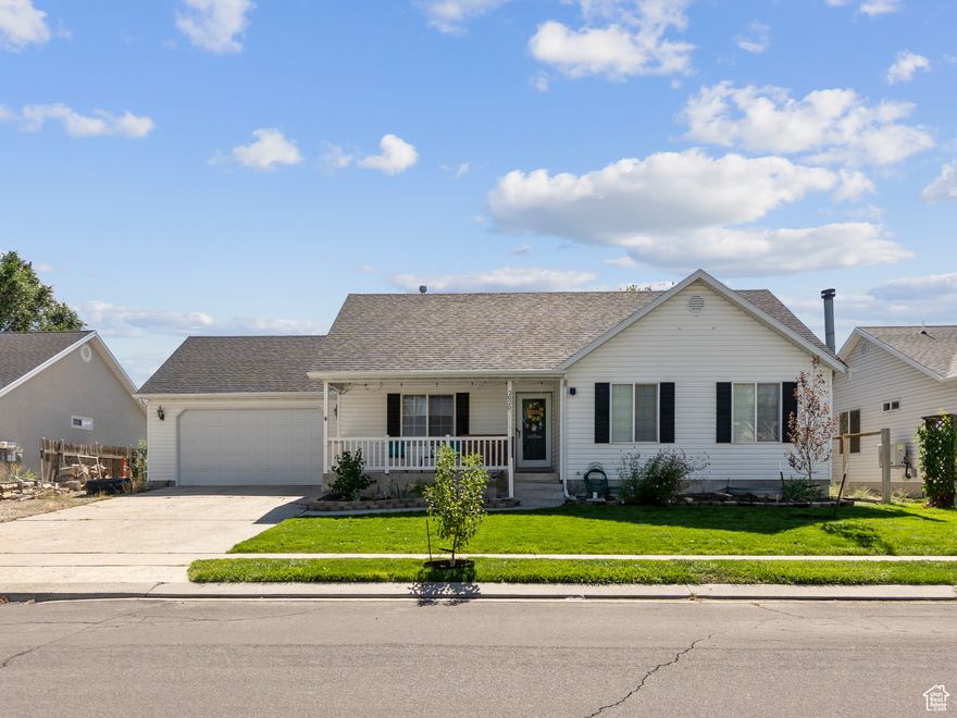 PRICED REDUCTION.  This spacious 5-bedroom, 3-bathroom home in located in a desirable Eagle Mountain neighborhood.  The newly finished basement features an office with a private walkout entrance.  Recent updates include a new garage door and opener, upgraded backyard sprinkler system, and a garden with drip irrigation and timer.  The yard features mature and newly planted trees, including an apple and a peach tree. The backyard is fully fenced in, and you can enjoy your privacy, with no backyard neighbors. Enjoy the welcoming front porch and the convenience of nearby amenities. The new roof was installed in Oct 2021.  Schedule your showing today!   Square footage figures are provided as a courtesy estimate only and were obtained from Property Tax .   Buyer is advised to obtain an independent measurement.