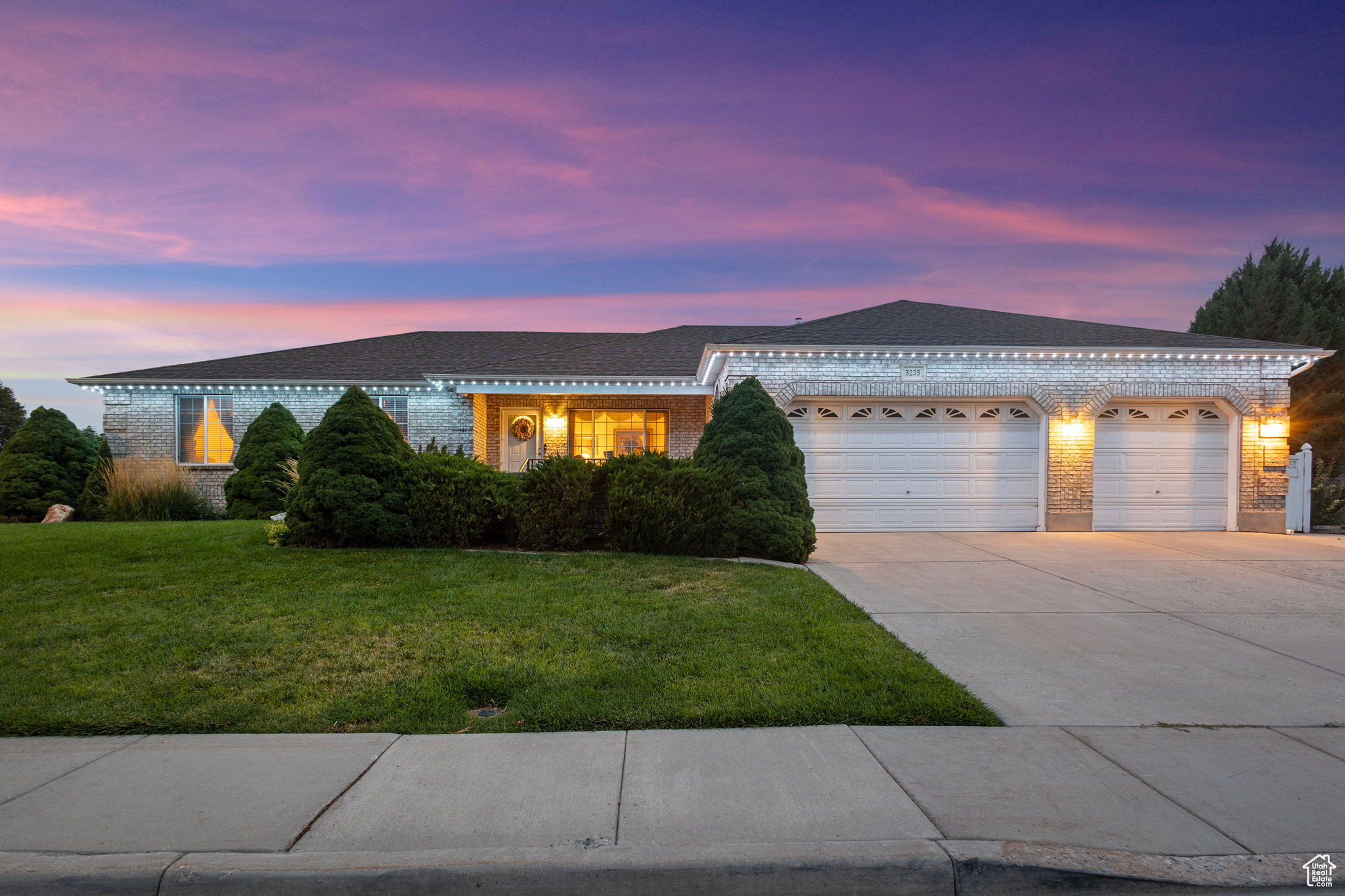 Discover this 5 bedroom, 3.5 bathroom home in West Valley City, featuring a traditional brick exterior that never goes out of style. Inside, you'll find generous living spaces, including a game room and TV room for family nights or casual entertaining. The kitchen and dining area with oak cabinets offers a warm, traditional touch and plenty of room for gathering. Set on a corner lot, the property includes a large landscaped backyard-perfect for summer BBQs and outdoor fun-as well as a 4-car garage with ample parking and storage. The home has Trimlight LED holiday lights and a central vacuum system! With its blend of timeless curb appeal and functional space, this home is ready for its next chapter.