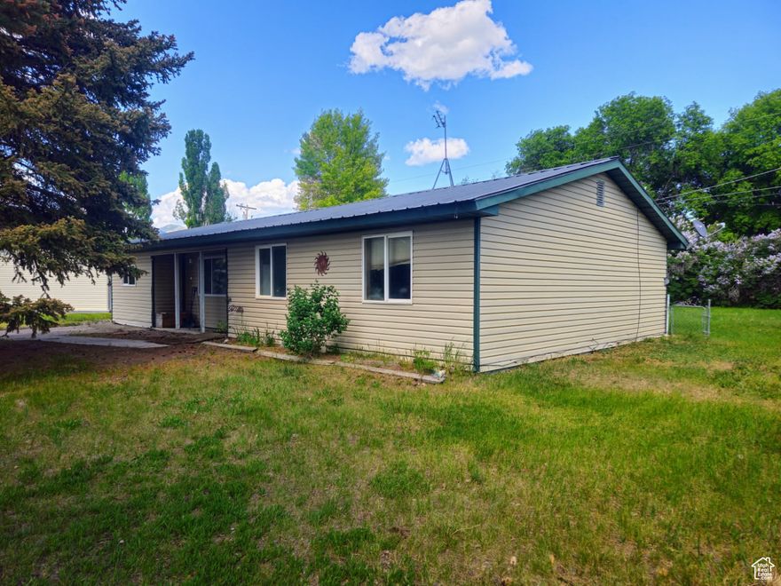 Price Reduced. Single level home in a quiet neighborhood on the north end of Montpelier Idaho. Spacious 3 bed 1 bath home with an office area or could be a 4th bedroom. Home has new carpet in 2 bedrooms, hallway and family room. Kitchen has newer flooring and lots of cabinet and countertop space.  Enjoy vegetables out of your own greenhouse connected to the back of the home. Good sized yard with mature trees and lots of lilac bushes. Lots of storage with sheds in the back yard. Contact listing agent for more info and to schedule your showings