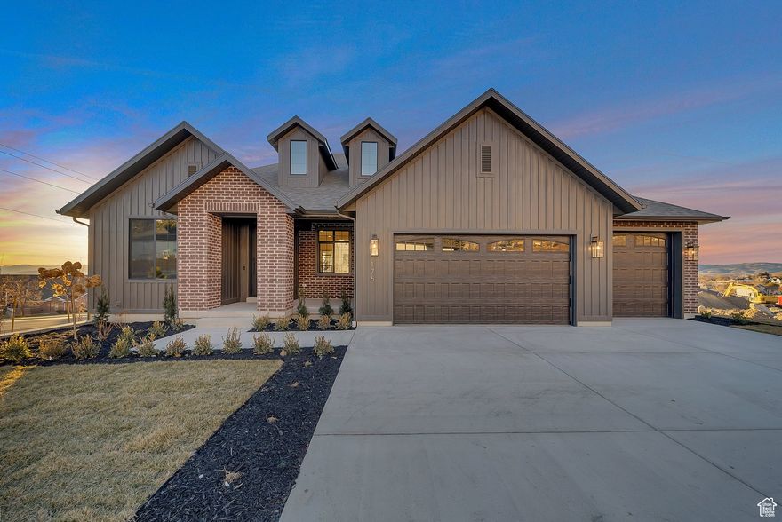 LOT#112. This beautiful Concerto plan by Symphony Homes is in a brand new community on the east bench, offering stunning mountain and lake views! Brand new home and already fully landscaped! Lots of upgrades and lovely interior design. You will love the custom trim work throughout the home, the stunning primary suite, the covered deck, and spacious floor plan. The finished daylight basement is great for entertaining all of your friends, featuring a game room and finished wet bar. You must see this home in person! The beautiful open kitchen has a 36" dual fuel range, custom vent hood, a large island, and plenty of space for your loved ones to gather. Don't miss it!