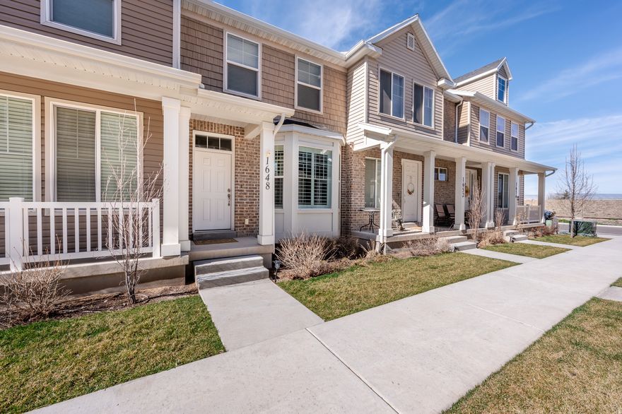 Better than new and meticulously maintained, this move-in ready Salem townhome offers beautiful mountain views, thoughtful upgrades, and low-maintenance living. The home has been exceptionally cared for-shoes have never been worn inside, and it shows in the pristine condition throughout. The bright open floor plan features a spacious living room that flows seamlessly into the kitchen and dining area, creating an ideal space for everyday living and entertaining. The kitchen includes granite countertops, stainless steel appliances, rich cabinetry, and a large center island with additional seating and storage. Large windows throughout the home bring in natural light and showcase the surrounding mountain scenery. Upstairs you'll find generously sized bedrooms with plush carpet and ample closet space. Bathrooms feature granite countertops and clean, modern finishes. This home stands out from others in the community with several upgrades already completed. Plantation shutters and window blinds have been installed throughout the home, providing both style and privacy. A water softener system has also been added for everyday comfort. Enjoy outdoor living in the private fenced patio area-perfect for relaxing or entertaining. The detached garage features a professionally epoxied floor, offering a clean, durable finish and additional storage potential.