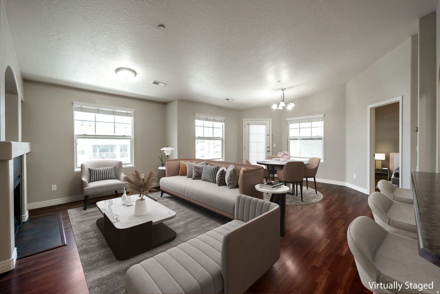 New Carpet! Take a look at this 3-bedroom, 2-bath top-floor condo nestled in the heart of the Daybreak community. Freshly updated with brand-new carpet, this home offers a bright, open layout with vaulted ceilings that create an airy, spacious feel. Enjoy evening sunsets from your private covered deck, complete with a built-in pet door-perfect for your small dog or cat to roam freely. The oversized laundry room and generous walk-in closets provide ample storage and convenience, while your covered parking space keeps your vehicle protected year-round. Whether you're a first-time buyer, downsizing, or seeking a low-maintenance lifestyle in a vibrant neighborhood, this condo checks all the boxes. With access to Daybreak's trails, parks, and community amenities, you'll love where you live.