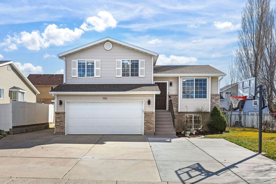 This charming 4-bedroom, 2-bath home offers comfort, updates, and great functionality all in one! Featuring an attached 2-car garage plus a detached 1-car garage, there's plenty of room for vehicles, storage, or a workshop. The home includes an updated kitchen with modern finishes, perfect for everyday living and entertaining. Major upgrades provide peace of mind, including a new roof installed in 2023 and a furnace and A/C system replaced in 2021. Step outside to enjoy the fully landscaped and fully fenced yard, offering privacy and space to relax, garden, or play. With so much to offer, this is truly a home you must see to appreciate!