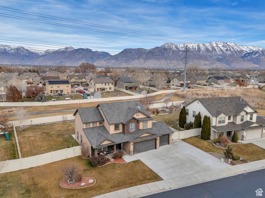 OPEN HOUSE JUNE 7 from 11am to 1pm: UPDATED Lehi 2-story featuring a SPACIOUS master suite with a LARGE LOT with additional parking and a HUGE gravel RV PAD! Home also features SPACIOUS family room, main level office space, and an open concept floor plan. South facing, allowing for prime driveway snow melt. Home also has a LARGE back yard and STUNNING curb appeal. EXCELLENTLY LOCATED near amenities like pickle ball courts, walking paths, multiple parks, I-15, & schools. PROTECTED traffic light to turn onto Pioneer Crossing. Seller has LOVED this neighborhood! Square footage is a mixture of county records & personal measurements & are provided as a courtesy only. Please give a 24 hour showing notice. Buyer/agent to verify all, including square footage.