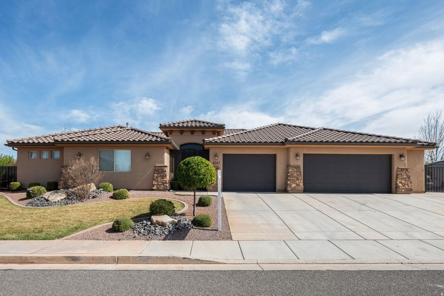 Welcome to this beautifully maintained home in Sugar Plum, offering a thoughtful design, and stunning southern Utah surroundings. This home features an inviting open floor plan with large windows that fill the home with natural light and frame the peaceful views of the neighborhood. At the heart of the home, you'll find a beautifully appointed kitchen with modern finishes, a large island, and seamless flow into the dining and living areas. The primary suite is generously sized with a spacious walk-in shower and walk-in closet. One of the outstanding features is the attached casita, complete with its own full-size refrigerator, sink, dining area with patio access, washer and dryer, private bedroom, and full bathroom, creating an ideal setup for guests or extended family. Step outside to enjoy a fully fenced and landscaped yard, covered patio, and RV parking with electrical hookups and sewer clean out. The location is near the soon to be Wheels Park, freeway access, Warner Valley and top-rated schools.