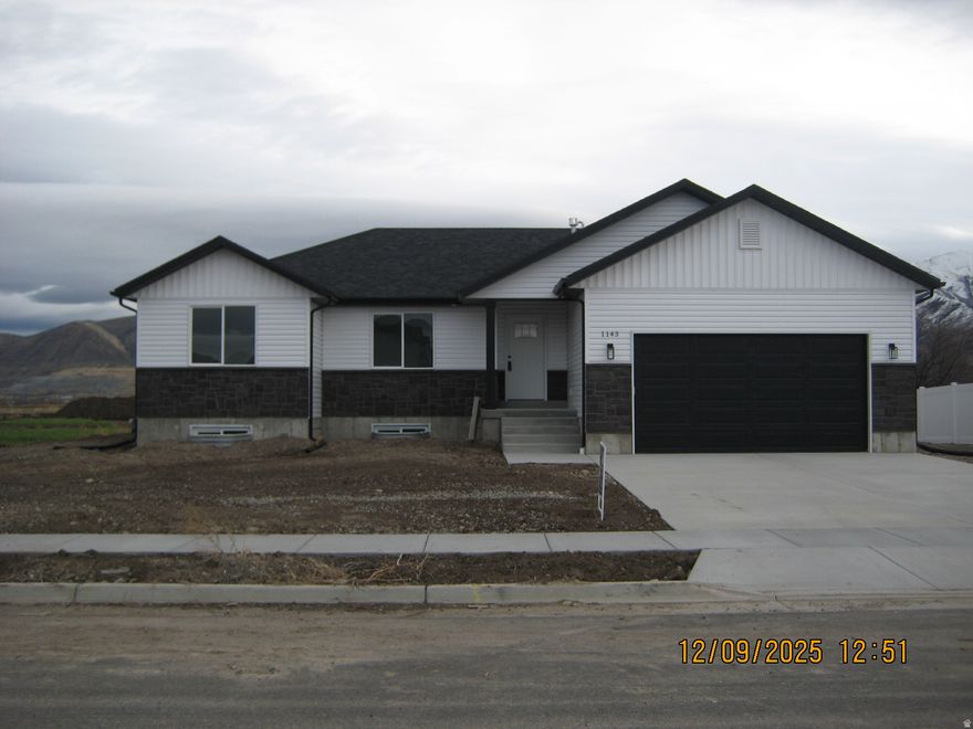 Beautiful new home, sits on .35 acre lot, great mountain views from back patio, desirable West facing home,  located in a new subdivision, tons of extras, granite counter tops, walk in closets, covered patio, 3 bedrooms 2 full baths, unfinished basement. Lot will have rough grade, Taxes  not accessed yet.
