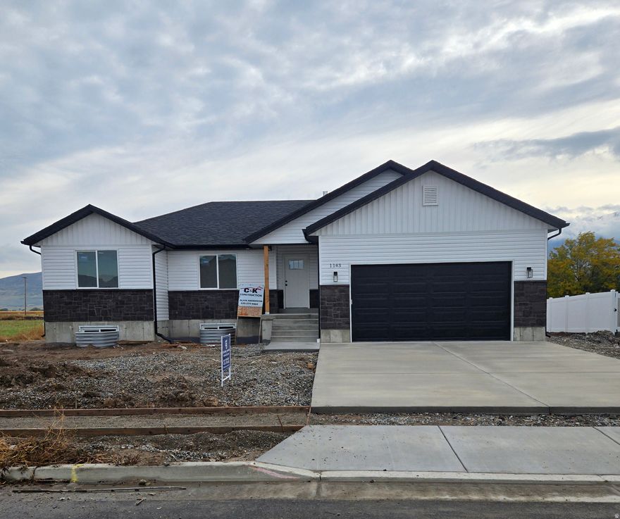 Beautiful new home, sits on .35 acre lot, great mountain views from back patio, desirable West facing home,  located in a new subdivision, tons of extras, granite counter tops, walk in closets, covered patio, 3 bedrooms 2 full baths, unfinished basement. Lot will have rough grade, Taxes  not accessed yet.