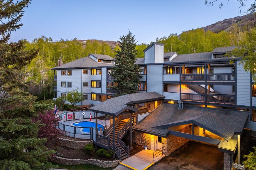 Tucked into the aspens at the base of Park City Mountain Resort, this top-floor corner residence at Snowflower is as convenient and cozy as it gets. With elevator access, private ski lockers on the main level, just steps from the slopes, and furnishings included, this property places everything you love about Park City within reach.The free town shuttle stop is located across the street and can deliver you to Canyons, Deer Valley or Historic Main Street in just a few minutes, and the summer hiking and mountain biking trails are quite literally outyour door.  Offering two-bedrooms, two-baths and a large sleeping loft,this sought after layout is a rare find at Snowflower boasting a vaulted great room, fireplace, new carpet and interior paint and views of the ski runs from the living room, spacious deck and the primary bedroom. The kitchen has been opened since its original design and with windows on 3 sides, the residence is flooded with light and a welcoming breeze.The bonus loft sleeps 4+ with two large bunk beds allowing this slopeside retreat to sleep up to 10 with ease. Nightly rentals allowed and offered turnkey.  The Snowflower community is amenity rich with multiple pools and hot tubs, a fully equipped fitness center, tennis & pickleball courts, heated underground parking, ski lockers and convenient visitor parking for each building.