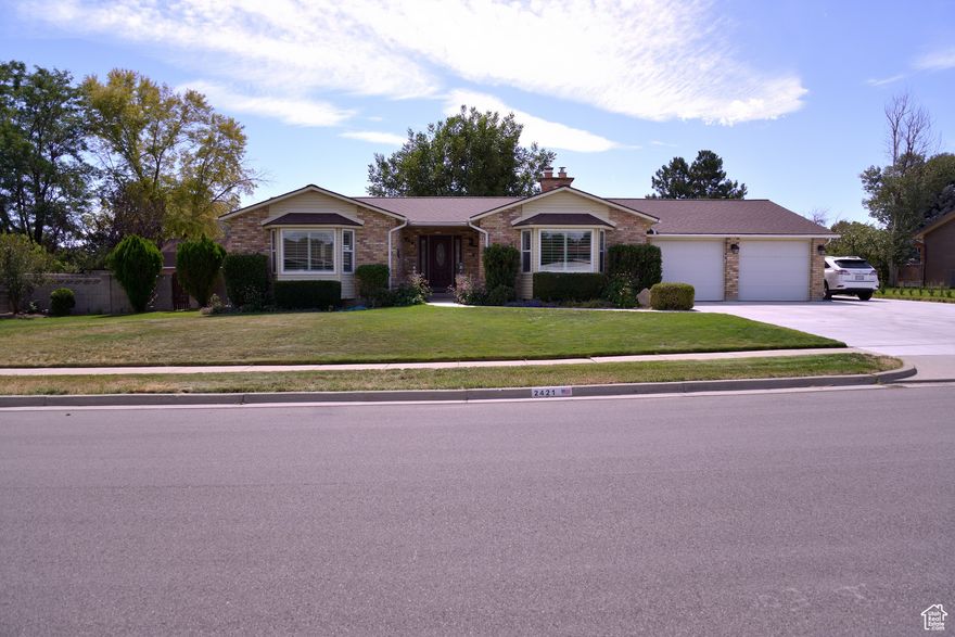 This beautiful rambler is in a quiet, peaceful neighborhood. It has a secluded fully fenced backyard with a lighted sport court and adjustable basketball standard. The cement court is perfect for pickleball or other activities. It has a large shed on a cement base. The home has a basement entrance. The gas fireplace upstairs has a temperature control for optimal comfort. The wood burning stove downstairs has a temperature control that triggers a fan that distributes heat throughout the basement. The furnace and air conditioner have a two-zone system that allows separate temperature control between upstairs and downstairs. Fully landscaped. The cement driveway and patio have been recently replaced with room for RV parking. This property is centrally located in the Salt Lake Valley with easy access to I-15 and I-215. Square footage figures are provided as a courtesy estimate only and were obtained from tax data. Buyer is advised to obtain an independent measurement.