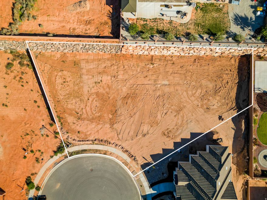 Stunning views, beautiful lot and amazing location!! These are just some of the ways to describe this gorgeous building lot in the Washington Fields area. Bring your own builder and enjoy the serenity that comes from the majestic red rock views and all of the scenery that Southern Utah has to offer. Located at the end of a quiet cul-de-sac, you can envision sitting on the patio of your custom dream home while enjoying great weather and more.  Located just a short drive from the new entrance to SR7, you have easy access to the entirety of the area.  Seller financing may be an option.