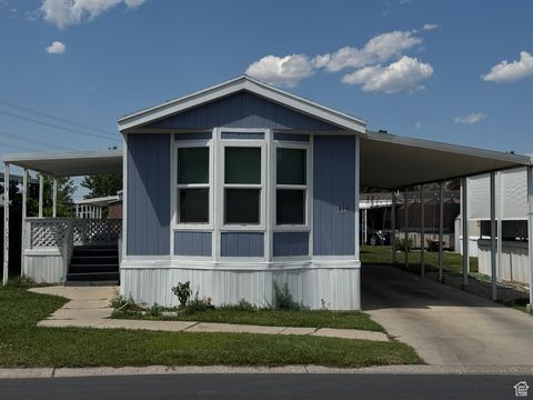 Photo of 898 W LITTLE MOUNTAIN DR S, Taylorsville, UT 84123 (MLS # 2100018)