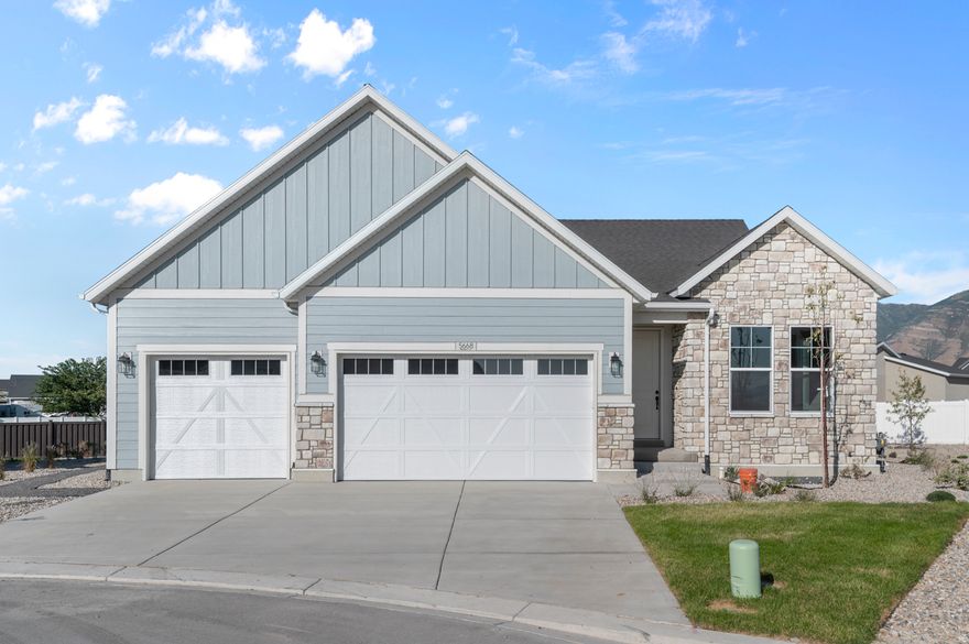 Beautiful brand new rambler Kimball Creek in a great Stansbury Park community near schools, parks, lake and more! Featured you will find a stylish kitchen with gray maple cabinets, quartz countertops, and stainless steel gas appliances, enhanced by a tile backsplash. Flooring includes laminate hardwood, tile, and carpet, while can lighting and Christmas light outlets add convenience and style. Other offered amenities are a 3-car garage with keypad & exit door, expanded patio, and finished basement space for extra living and storage. Interior highlights include a gas log fireplace, wood railing at the stairway, two-tone paint, and Craftsman base & casing. The owner's bathroom showcases cultured marble shower surrounds with black matte hardware. Along with a tankless water heater, energy-efficient and full yard landscaping this home offers a move in ready, low cost living experience!