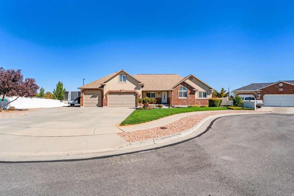 Photo of 4838 W CHERRY LAUREL LN S, West Jordan, UT 84081 (MLS # 2184010)