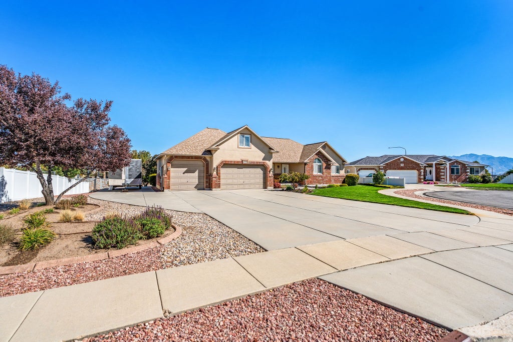 Photo of 4838 W CHERRY LAUREL LN S, West Jordan, UT 84081 (MLS # 2184010)