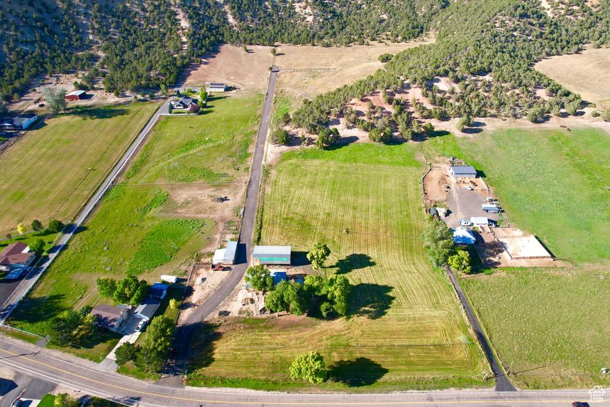 Homesteaded and owned by one family until now! This ready to build piece of horse property is now up for sale. All amenities already on the property but septic tank. Come build a home and ranch of your dreams in a community you only hear a bout anymore. The schools are some of the top in the state in all areas! An amazing place to raise horses, kids or dogs. Even better place to retire and watch the sunset over the Coalville cliffs the rest of your days. The perfect almost 10 acre ranch with hay barns, wide open fields and more than enough views for any point in life!