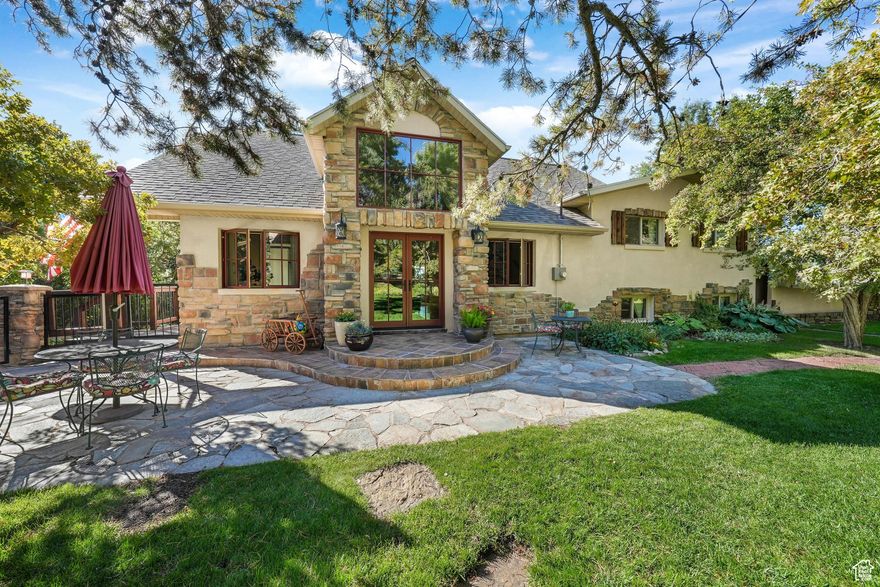 Your Private Mountain Retreat Awaits! Tucked behind a private drive and secured with an electric wrought-iron gate, this stunning estate delivers rare seclusion and timeless elegance. Surrounded by trees, with Beus Canyon trailhead just steps away, it feels miles from everything yet you're only minutes from the University, hospital, shopping, and dining. Inside, the home has been fully reimagined with a long list of thoughtful updates: new roof and living room windows, a completely redone custom kitchen and pantry, gas-converted fireplaces, fresh hardwood and carpet, remodeled bathrooms and bedrooms including a primary suite with custom closet system, upgraded systems throughout, and much more. Every detail has been considered so you can simply move in and enjoy. The grounds are equally impressive, fully landscaped with secondary water irrigation, cross-fencing, multiple fruit trees, and a year-round stream (Beus Creek) that adds to the tranquil setting. A 2,000 square foot two-story barn with power, along with a garden shed, provide endless possibilities for hobbies, storage, or future projects. Mountain living, city convenience, and a home that has it all. Come experience the privacy, beauty, and lifestyle this estate offers and don't forget to check out the "hidden playroom"!