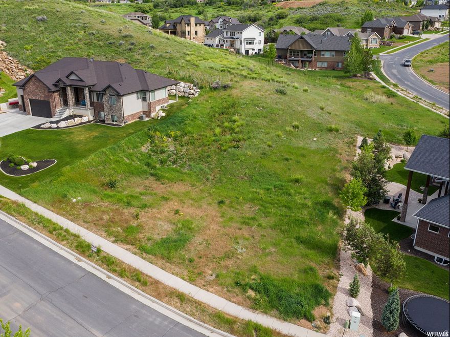 Is this the best buildable lot in Mountain Green? Cul-de-sac. No traffic. Minimal dirt work. Scenic views of Mt. Ogden and Thurston Peak. Quiet. See the stars at night and enjoy the fresh air while being only 13 minutes to Snowbasin and a fast drive to Layton, South Ogden and Riverdale. Top rated schools. 37 Minutes to Salt Lake International airport. 20 minutes to Pineview Reservoir. 30 minutes to East Canyon. 40 minutes to Echo Reservoir. Live in a friendly and beautiful community out in the country, but only a few minutes from everything in the city. Only 21 min to Mckay-Dee and 20 min to Hill AFB. Favorite things about this community: Almost zero mosquitos! Very rare to see one. Awesome trail system with 12 miles of single track for hiking and biking. A skier's paradise. A friendly and peaceful community.