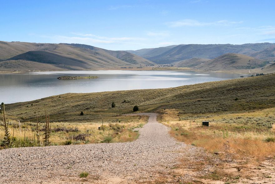 Seize the opportunity to own a prime piece of land in the scenic community of Scofield, where luxury meets leisure. This 1.74 acre lot is not only a canvas for your dream cabin, or camping but also includes an array of fantastic amenities. Enjoy exclusive access to a basketball court, tennis court, BBQ area, pavilion, horseshoe pits, volleyball court, and a children's play area-all just a quick drive, or walk down the road. Water and electrical connections are already in place, making your build process, or glamping smooth and efficient. Set amidst breathtaking mountain views and a serene environment, this lot offers the perfect balance of relaxation and recreation. Don't miss out on this rare opportunity to create your ideal lifestyle in Scofield!  Septic Tank is available, but not installed.