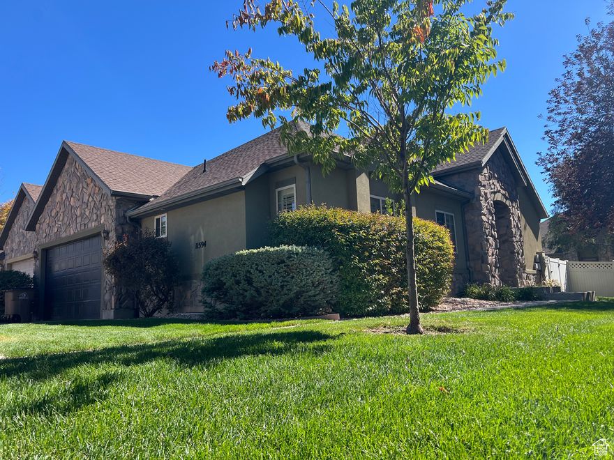 LIKE NEW- MUST SEE-  REDUCED. Hard to find Rambler Townhome in Quiet Gated Community.   Just Updated with New Paint, Carpet,  Fixtures,  Lighting , Hardware and More.   2 Kitchens. Laundry on Both Levels.   Full Basement.   Complex has Great Amenities and is Close to Everything.   Also Great for Extended Family Members.  Easy to Show. Key boxed.