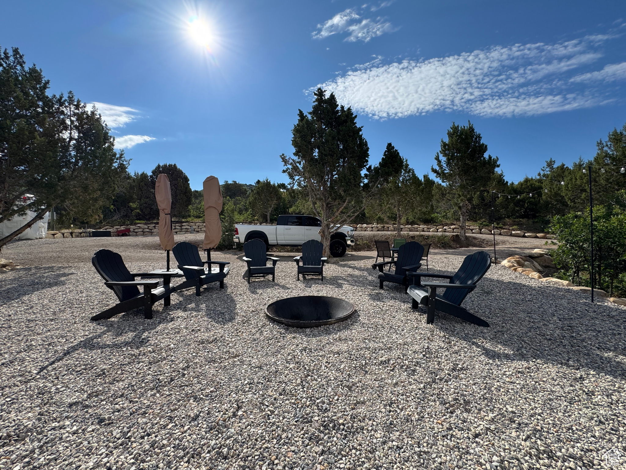 Turn key one acre lot in Skyline Mountain Resort with year around access! Includes access to pool, waterslide, pickleball court, and golf course!!! This property is what you have been looking for!! Million dollar views and no work needed!! There are 2 water connections, 2 (50amp) connections, and 2 septic connections!! All the grading and retaining has been done and tons of gravel has been brought in. Plus you have year around access!! This is the most functional, usable lot you have ever seen. 1: 37 ft 5th wheel with 4 slide outs is included with the sale. Check out the pictures and YouTube video and then schedule your showing!