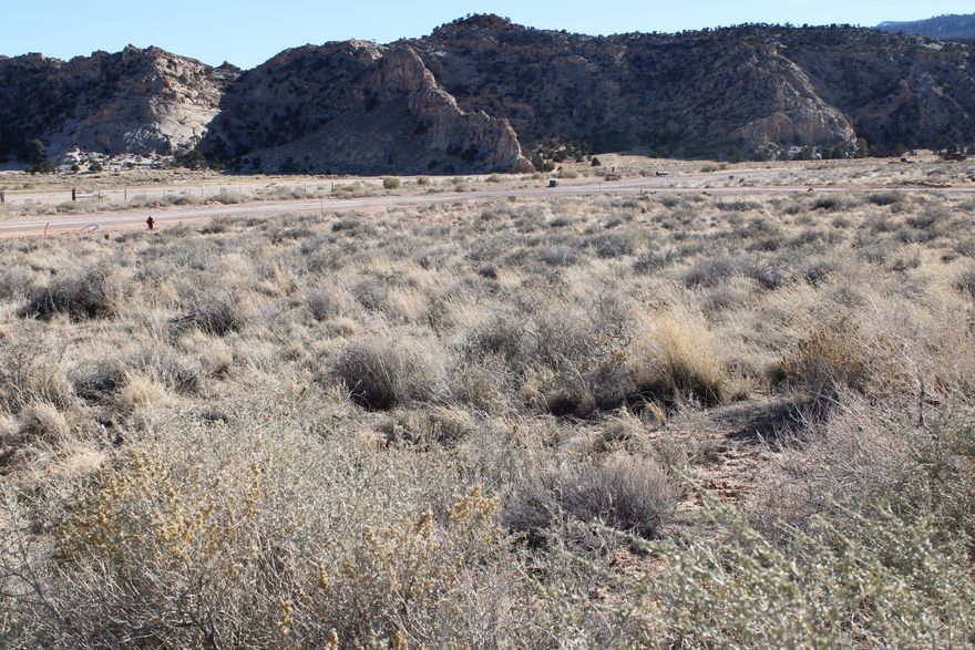 Discover your own slice of serenity in Teasdale, UT! These 1 and 1.5-acre parcels are surrounded by jaw-dropping white and red rock mountains, offering breathtaking views in every direction. The peaceful, serene setting makes this the perfect escape from city life and summer heat. Just 12 miles from Capitol Reef National Park and close to Boulder Mountain and other iconic destinations, this location is ideal for outdoor lovers and adventure seekers alike. From hiking to stargazing, the possibilities are endless. This is a property you truly have to see in person to believe and experience the magic for yourself.