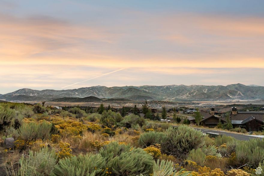 Elevate your mountain living experience with this RARE 3.8-acre estate homesite, perfectly positioned atop Promontory for unobstructed vistas of the world-renowned Wasatch Back ski runs, the sparkling Rockport Reservoir, and the pristine Uinta National Forest. With a generous 21,000 sq. ft. building envelope and fully approved architectural plans by Habitations, this premier lot is ready to showcase a custom legacy estate of unmatched scale and sophistication. A thoughtfully DESIGNATED PATIO envelope offers a separate, private setting to frame breathtaking sunrise, sunset and lake views. An exclusive Promontory Club social membership is available by separate transaction, offering privileged access to the community's unparalleled amenities: a world-class equestrian center, private alpine lodges in Deer Valley and Park City, three championship golf courses, a pristine Nordic trail system, The Beach Club with winter tubing hill, resort-style pools and spas, state-of-the-art fitness facilities, and a collection of eleven stunning clubhouses with dining that rivals the finest resorts. With quick in and out access to the main gate, this homesite represents more than a property, it's an invitation to create a generational retreat at the most coveted address in Promontory. Call for a private tour!