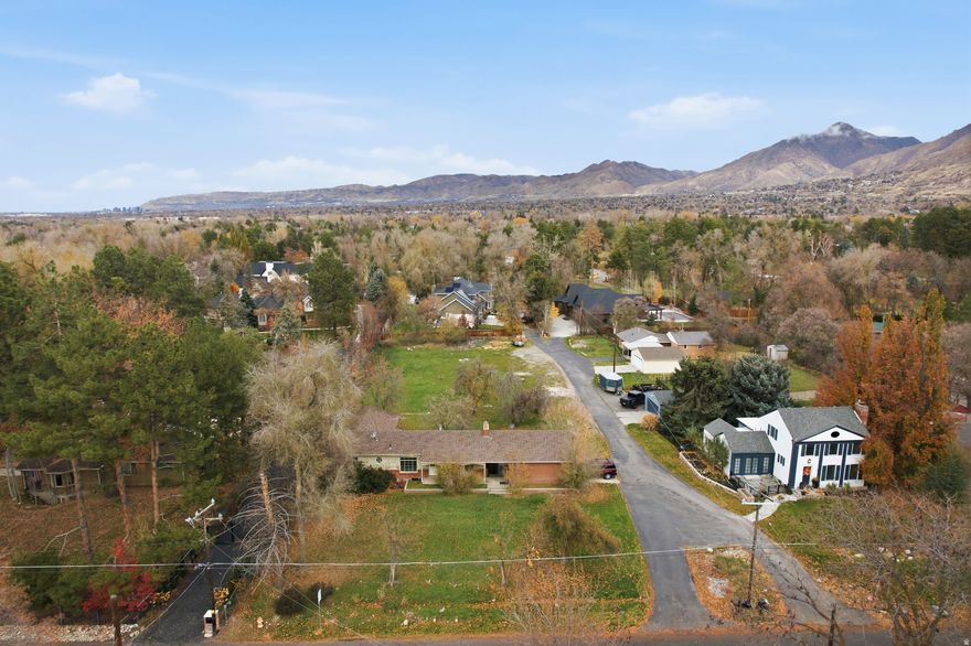 Presenting a rare opportunity to acquire the only large acre lot nestled in the heart of Holladay. This premium lot offers a unique combination of privacy, space, and mountain views.  The property's considerable depth allows for a generous front setback along with an expansive, private backyard. There is an older home on the property that has not been lived in for more than 10 years, so seller cannot provide any property condition disclosures for the home.   *Buyer to verify all*  Agent is related to the sellers and has ownership in the property